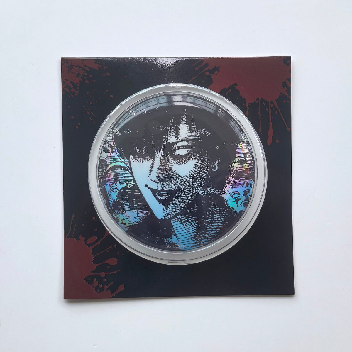 Manxu Junji Ito Maniac large iridescent badge with a monochrome portrait