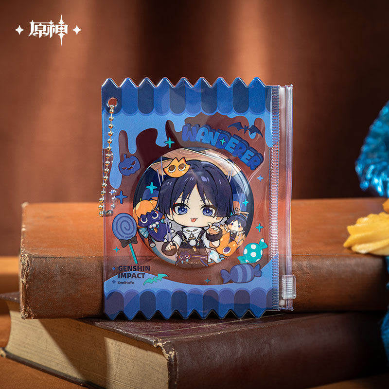 Wanderer badge and transparent protective sleeve displayed on books