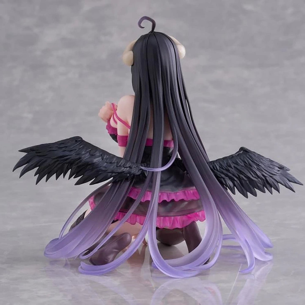Rear view of Albedo Negligee Version showing feathered wings and long purple-tipped hair