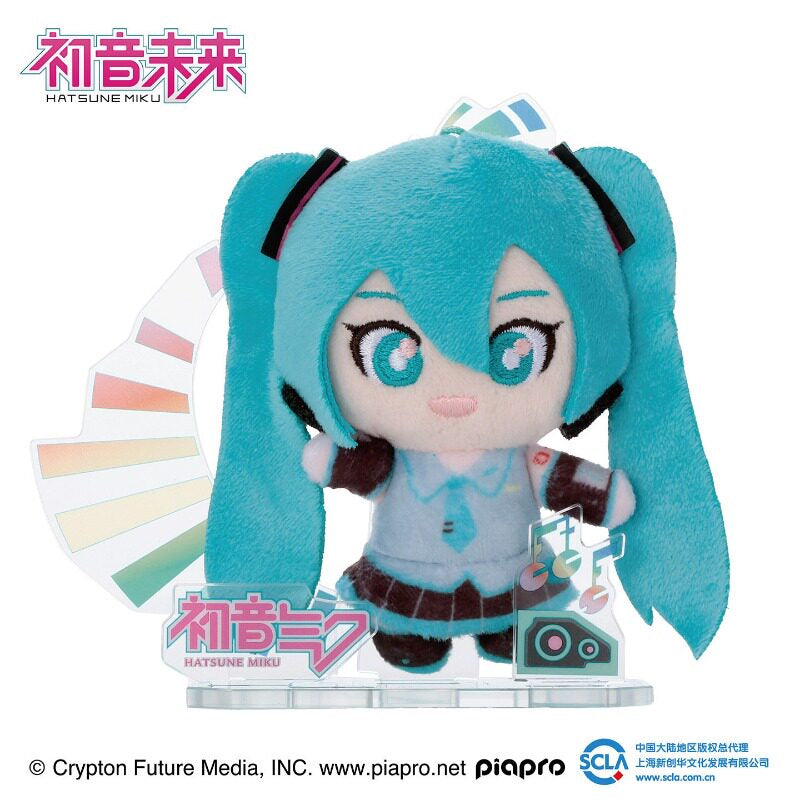 Hatsune Miku plush in her classic outfit with acrylic music scene